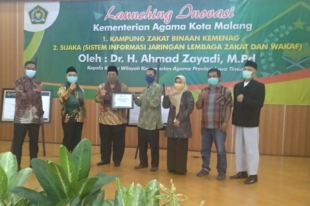 Bersama jajaran Kemenag Kota Malang dan pengurus Kampung Zakat dan SIJAKA