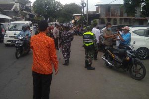 Edukasi prokes di Pasar Sukun. (ist) - Pendisiplinan PPKM, TNI-Polri Edukasi Prokes Pasar Sukun