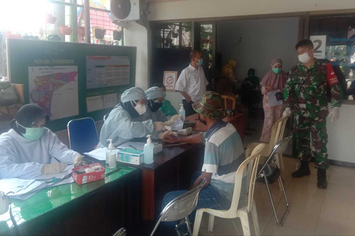 Vaksinasi lansia dan masyarakat umum di Kelurahan Tanjungrejo Sukun. (ist) - Forkopimcam Sukun Dampingi Vaksinasi Lansia dan Masyarakat Tanjungrejo