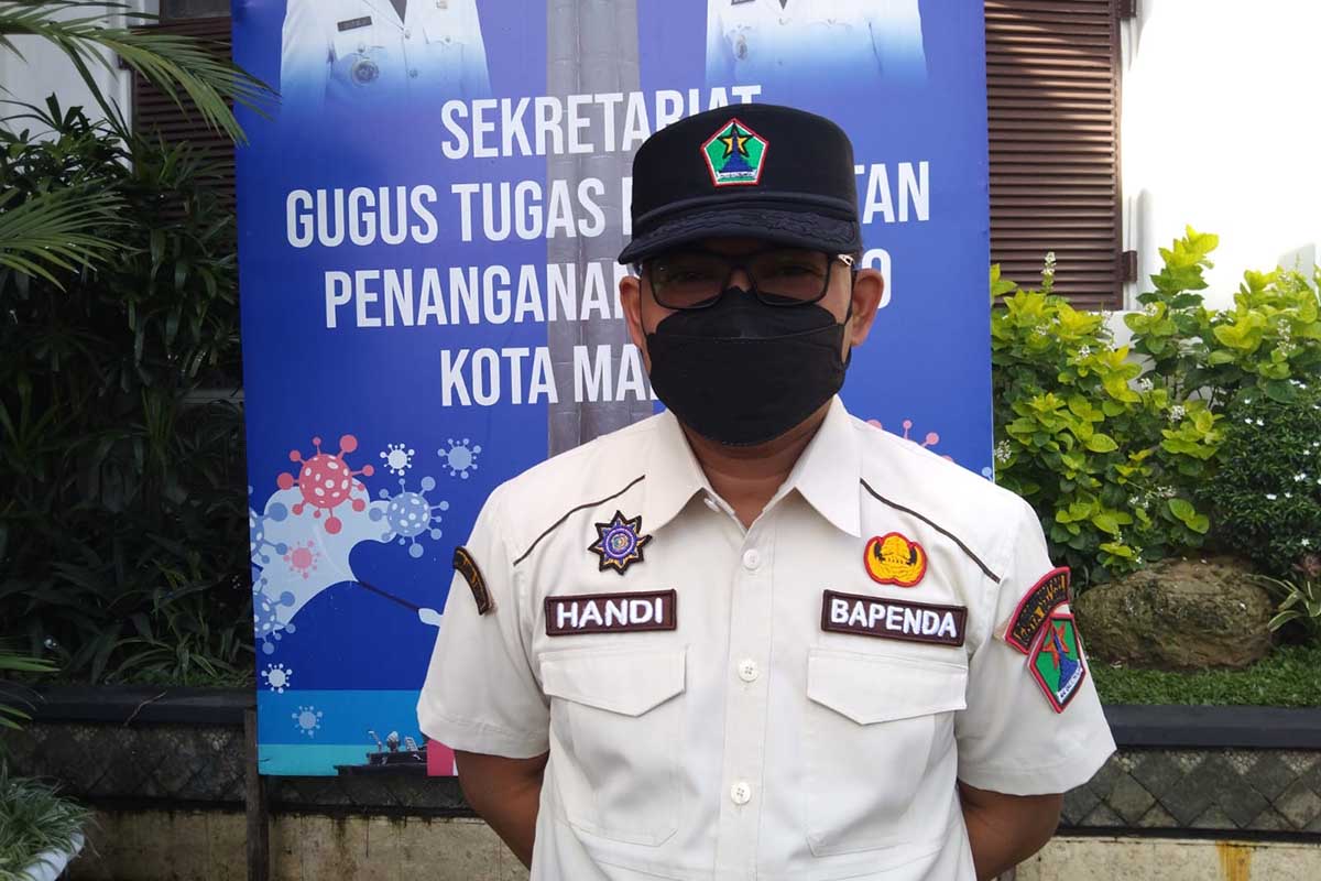 Kepala Bapenda Kota Malang ditemui di depan Balaikota Malang. (jaz) - 900 Ghost Resto Kaget Terendus Pajak di Kota Malang