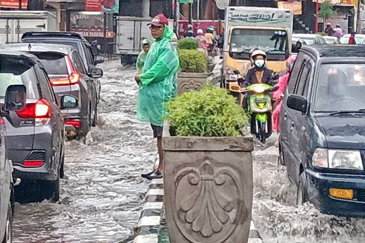 Ilustrasi genangan air hujan di Kota Malang. (ist) - Master Plan Drainase Kota Malang Terkesan Lamban