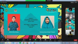 Nurisna Anara Mughni Rayyan dan Daffa Atha Arkana meraih juara 2 dalam Olimpiade Matematika Astec 2022. (ist) - Jelang Akhir TA 2021/2022, MTsN 1 Kota Malang Persembahkan 1.523 Prestasi