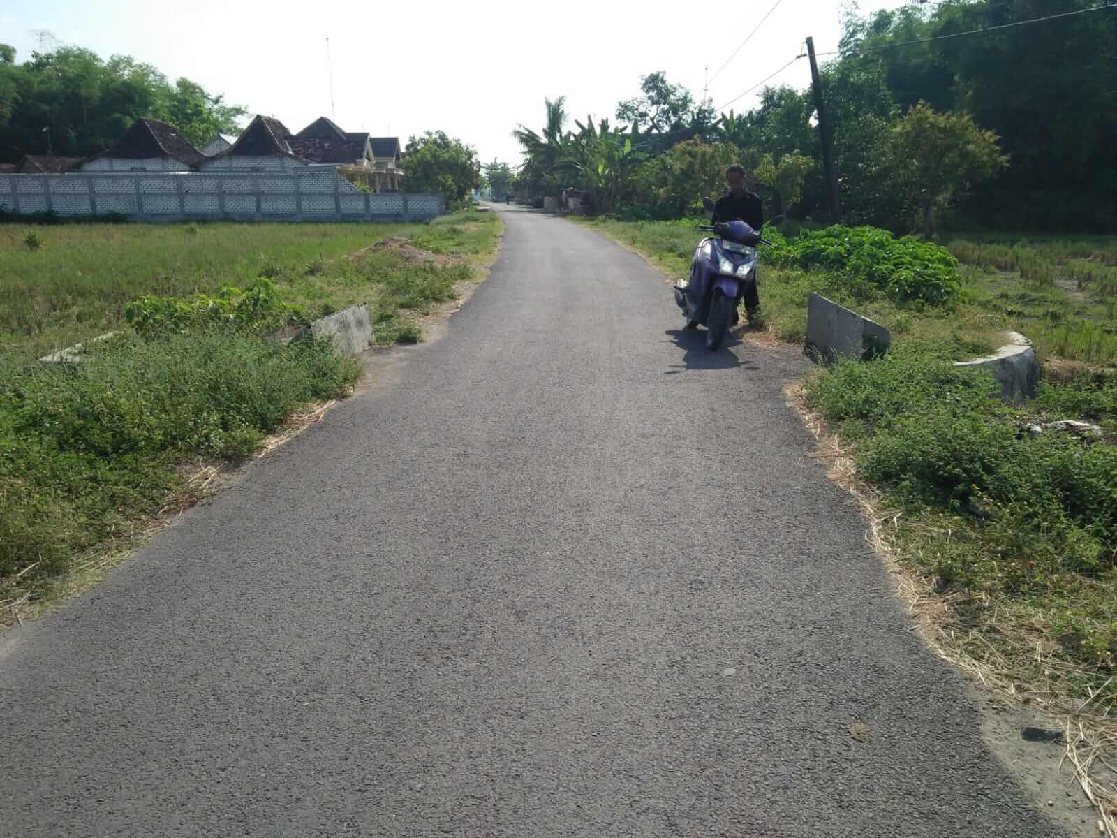 pengaspalan jalan desa mudung berkat dana bkd