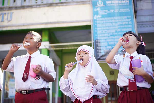 Kegiatan Sikat Gigi Bersama dalam peringatan HKGN 2022. (ist) - Peringati HKGN Ratusan Siswa di Batu Sikat Gigi Bersama