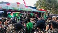 Apel 10 ribu kader GP Ansor dan Banser. (wul) - Puncak Satu Abad NU, 10 Ribu Kader GP Ansor dan Banser Kab Malang Ikuti Apel Merah Putih
