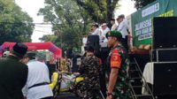 Babinsa Klojen amankan Jalan Sehat Kreatif Satu Abad NU. (ist) - Babinsa Klojen Turut Amankan Jalan Sehat Kreatif Satu Abad NU