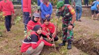 Babinsa Tunjungsekar laksanakan penanaman pohon penghijauan. (ist) - Babinsa Tunjungsekar Laksanakan Penanaman Pohon Penghijauan