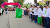 Wali Kota Malang, Sutiaji, memberangkatkan peserta Jalan Sehat Kreatif Satu Abad NU. (ist) - Ribuan Warga Nadhliyin Tumplek Blek Ikuti Jalan Sehat Kreatif Satu Abad NU