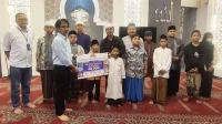 Santunan 200 anak yatim di 4 panti asuhan sebesar Rp60 juta. (rhd) - BRI Regional Malang Berbagi Bahagia Santuni Yatim Dhuafa Lansia Senilai Rp500 Juta