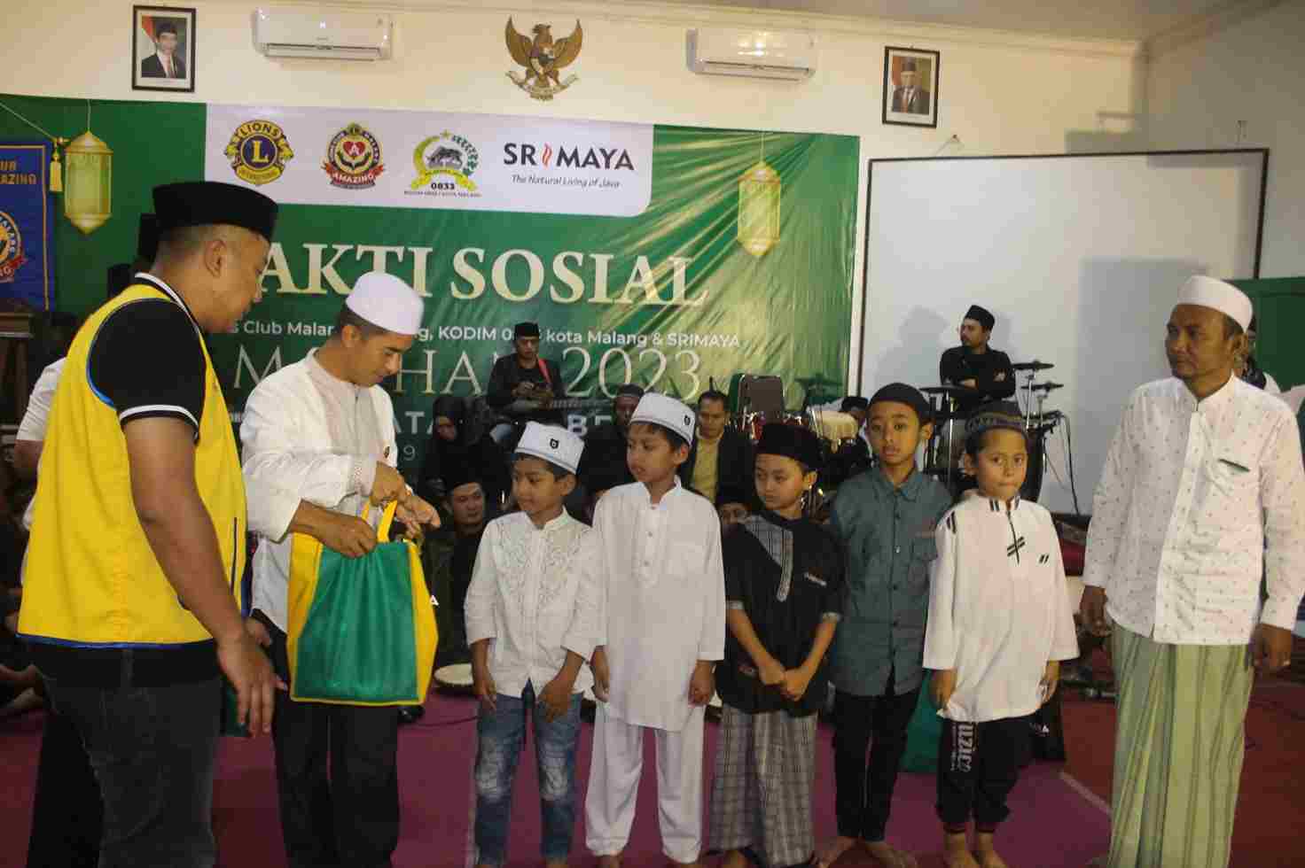 dandim 0833 kota malang membagikan santunan anak yatim piatu