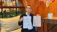 rahadi sri wahyu jatmika s.h. m.h saat menunjukkan hasil lp