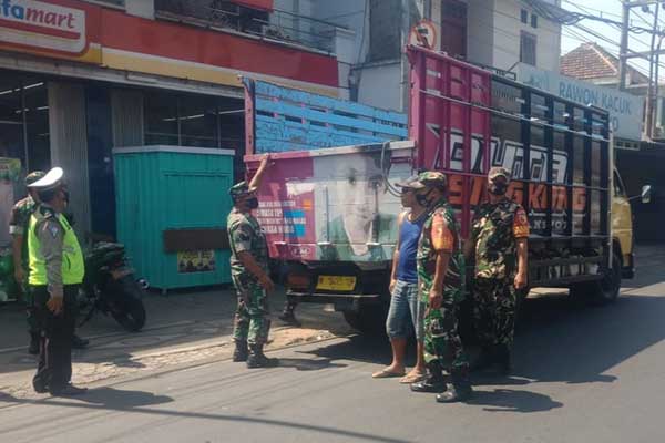 Personel Kodim 0833 masifkan Pos Pam PMK Kota Malang. (ist) - Kodim 0833 Masifkan Pos Pam PMK Kota Malang