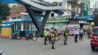 Babinsa Lowokwaru bantu urai kemacetan sekitar Terminal Landungsari. (ist) - Babinsa Lowokwaru Bantu Urai Kemacetan Sekitar Terminal Landungsari