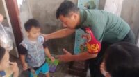 Babinsa Pisang Candi dampingi posyandu balita. (ist) - Babinsa Pisang Candi Dampingi Posyandu Balita