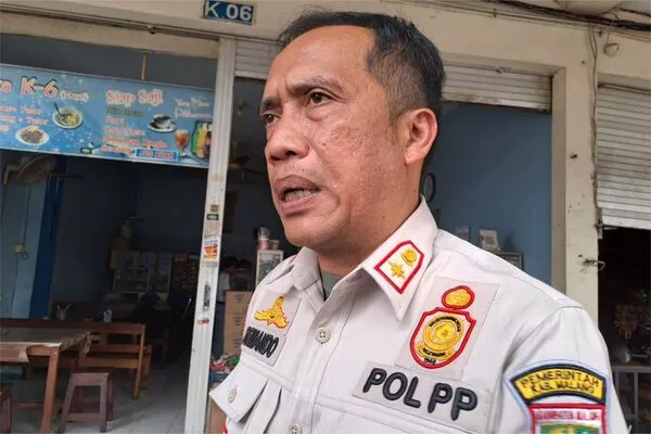 Plt Kepala Dispora Kabupaten Malang, Firmando Hasiholan Matondang.(ist) - Waktu Renovasi Mepet, Pemkab Masih Mendiskusikan Tiga Opsi Relokasi Penyewa Ruko