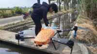 Drone sprayer yang akan diterbangkan untuk melakukan penyemprotan. (ist) - Teknologi Drone Sprayer untuk Mempermudah Kerja Petani dalam Bercocok Tanam
