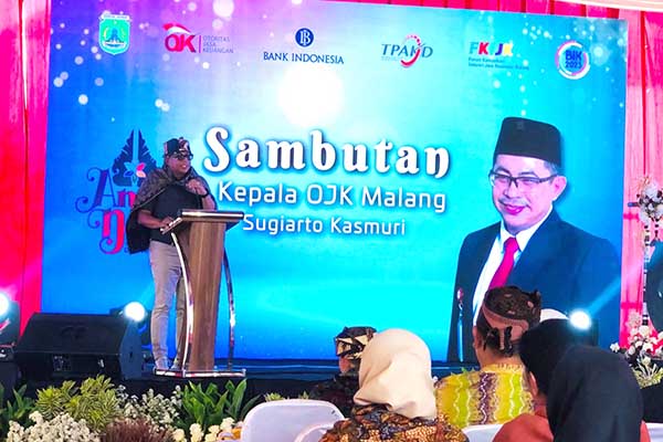 Sambutan Kepala OJK Malang, Sugiarto Kasmuri. (wul) - Desa Wisata Tosari Jadi Percontohan Ekosistem Angin Dewi