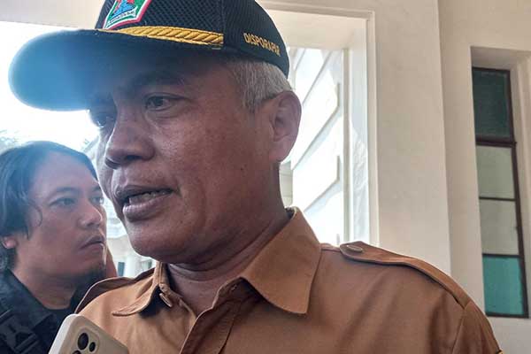 Kepala Disporapar Kota Malang, Baihaqi menjawab pertanyaan awak media. (Seru.co.id/ws8) - Rehab Stadion Gajayana Butuh Biaya Besar
