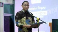 Kadisdik Jatim, Dr. Aries Agung Paewai SSTP MM saat menghadiri sebuah kegiatan SMK. (ist) - Ini Harapan Kadisdik Jatim bagi SMK di Kota Batu