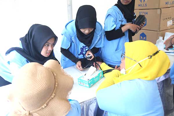 GenYZ Sinar Pagi melakukan pemeriksaan kesehatan dan pengobatan gratis. (ist) - Sederet Bintang Tamu Hibur Fun Run Village hingga Pemeriksaan Kesehatan