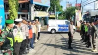 Babinsa Koramil Lowokwaru Jaga Keamanan Pemudik di Pos Pam UB