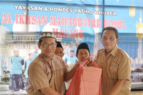 PWI Malang Raya Berbagi Ratusan Nasi Kotak ke Panti Asuhan