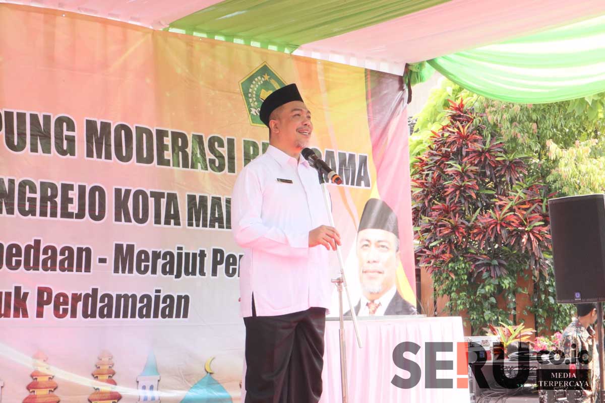 Kepala Kemenag Kota Malang, Achmad Shampton SHI MAg menyampaikan sambutan. (ws11) - Pj Wali Kota Malang Dukung Kampung Moderasi Beragama, Wujud Kerukunan Umat