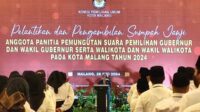 Ketua KPU Kota Malang menyampaikan pesan kepada anggota PPS yang dilantik. (rhd) - KPU Kota Malang Lantik dan Sumpah Janji 171 Anggota PPS