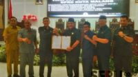 Penyerahan Draft Perda Kota Layak Anak, DPRD dan Pemkot Malang. (ws11) - Pj Wali Kota Malang Bersyukur Miliki Perda Kota Layak Anak