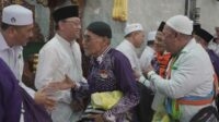 Kedatangan Jemaah Haji Kota Batu disambut jajaran kantor Kemenag Kota Batu. (ist) - Jemaah Haji Kota Batu Tiba Kembali di Tanah Air