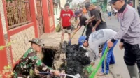 Babinsa Kedungkandang Bersama Linmas dan Masyarakat Bumiayu Karya Bhakti GASS