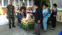 Babinsa Ketawanggede Dampingi Penyaluran Bantuan Pangan Beras Bagi 101 KPM