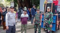 Babinsa Koramil Kedungkandang amankan Kirab Tumpeng 1 Muharram 1446 H. (ist) - Babinsa Koramil Kedungkandang Amankan Kirab Tumpeng 1 Muharram 1446 H