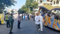 Babinsa Koramil Klojen Amankan Kirab Tahun Baru Islam 1446 H