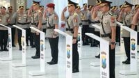 Jabatan Kapolres Situbondo, diserahterimakan dari pejabat lama, yaitu AKBP Dwi Sumrahadi Rakhmanto kepada AKBP Rezi Dharmawan, Rabu (17/7/2024). (Seru.co.id/aza) - Kapolres Situbondo Resmi dijabat AKBP Rezi Dharmawan