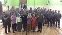 Babinsa Sukun Dampingi Rapat Evaluasi Satlinmas di Kelurahan Kebonsari