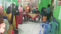 Babinsa Koramil Kedungkandang Dampingi Penyaluran Bantuan Pangan Pencegahan Stunting Warga Kotalama