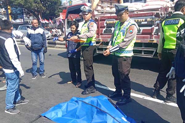 Lokasi kecelakaan di Kecamatan Singosari dengan satu orang korban meninggal dunia di TKP. (ist) - Sepeda Motor Vs Truk, Seorang Pria Tewas di Singosari