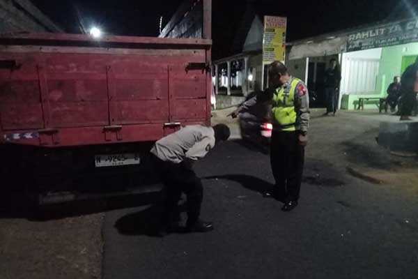 TKP kejadian bocah 12 tahun di Turen alami kecelakaan tabrak belakang hingga tewas. (ist) - Bocah 12 Tahun di Turen Tewas Setelah Tabrak Truk Terparkir di Pinggir Jalan