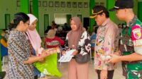 Babinsa Lowokwaru Dampingi Penyaluran Bantuan Pangan Peduli Stunting