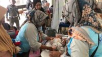 Kegiatan posyandu di Kantor Desa Gondanglegi Kulon. (Seru.co.id/wul) - Sanusi Janjikan Insentif Kader Posyandu Naik Menjadi Rp2 Juta