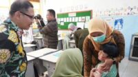 Pj. Aries Targetkan Pencapaian Bulan Imunisasi Anak Sekolah di Batu Minimal 95 Persen