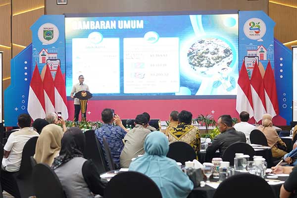 Pj. Wali Kota Batu memberikan sambutan di depan pengembang property di Kota Batu. (ist) - Kota Batu Fasilitasi Perizinan Terintegrasi untuk Pacu Pertumbuhan Investasi Properti