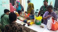Babinsa Klojen dampingi pasar murah. (ist) - Babinsa Klojen Dampingi Pasar Murah, Jaga Stabilitas Harga Bahan Pokok