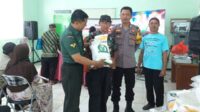 Babinsa Lowokwaru Komitmen Dampingi Penyaluran Bantuan Pangan Warga Tunggulwulung