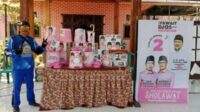 Kegiatan kampanye di Balai Desa Rambipuji. (ist) - Acara Fun Bike di Balai Desa Rambipuji Jember Diduga Diselingi Kampanye Paslon Nomor 2