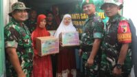 Kodim 0833 bagikan sembako kepada warga kurang mampu di Samaan. (ist) - Kodim 0833 Bagikan Sembako kepada Warga Kurang Mampu di Samaan