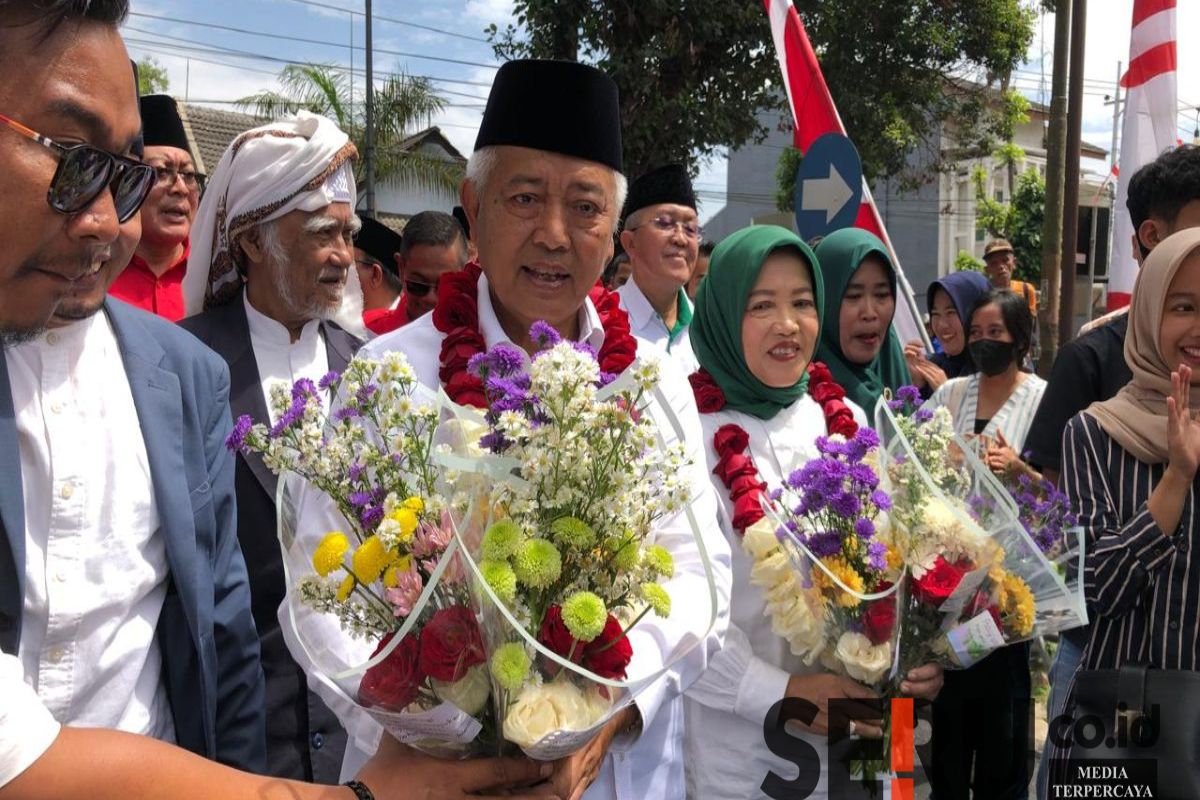 Pasangan Calon (Paslon) Bupati dan Wakil Bupati Malang nomor urut satu, Sanusi-Lathifah Shohib (Salaf). (Seru.co.id/wul) - Sanusi-Lathifah akan Kompak Tingkatkan Kesejahteraan PMI di Dalam Negeri