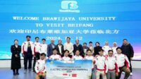 Perwakilan mahasiswa UB foto bersama Beifang Automotive Education. (ist) - Mahasiswa UB Perdalam Teknologi Electric Vehicle di Beifang Automotive Education China