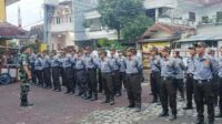 Babinsa Lowokwaru Bekali Linmas Dinoyo Pelatihan Kedisplinan dan Bela Negara